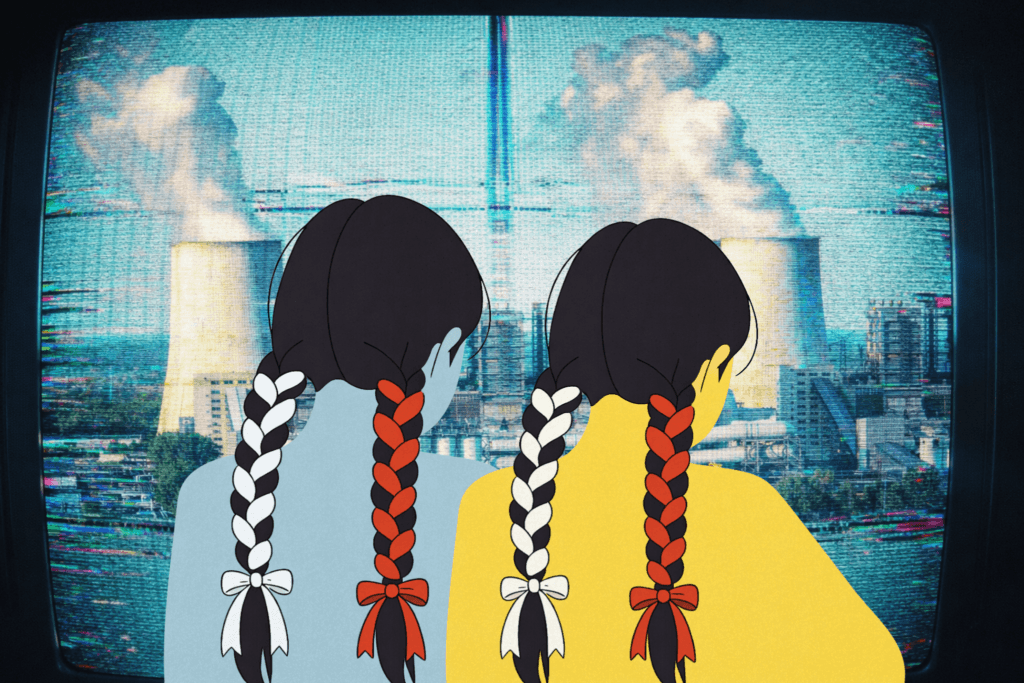 Dwie dziewczynki na tle elektrowni atomowej