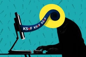 Osoba przy komputerze z logo KSeF