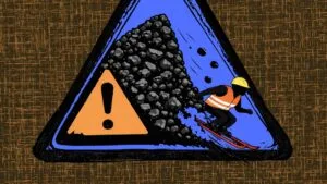 Grafika przedstawiająca górnika na nartach zjeżdżającego z hałdy węgla. Obok niej umieszczony jest znak ostrzegawczy