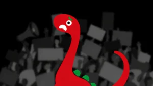 Czerwony dinozaur z przerażoną miną wśród protestujących.